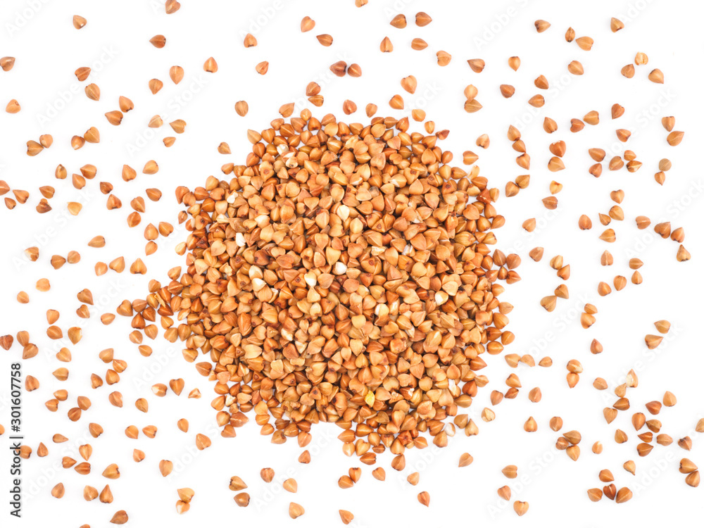 Buckwheat groats on white background. Healthy eating concept Buckwheat groats on white background. Healthy eating concept