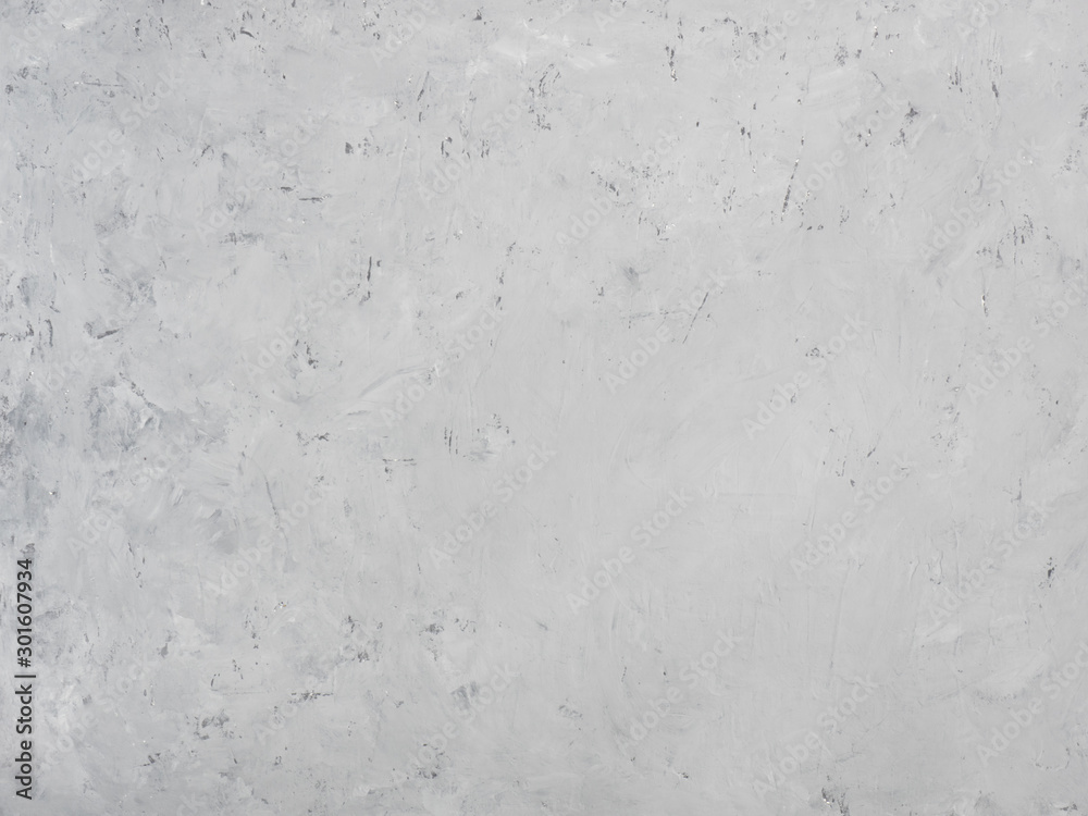 Gray concrete background with white stains and spots