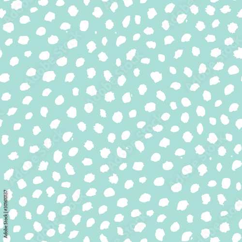 Spotted hand drawn seamless pattern.
