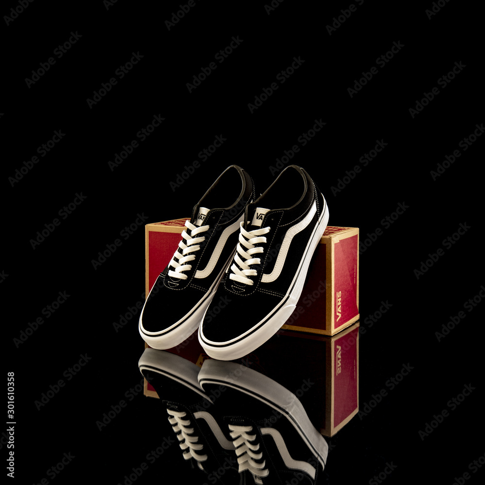 Brand new black and white Vans Old Skool shoes studio portrait Stock Photo  | Adobe Stock