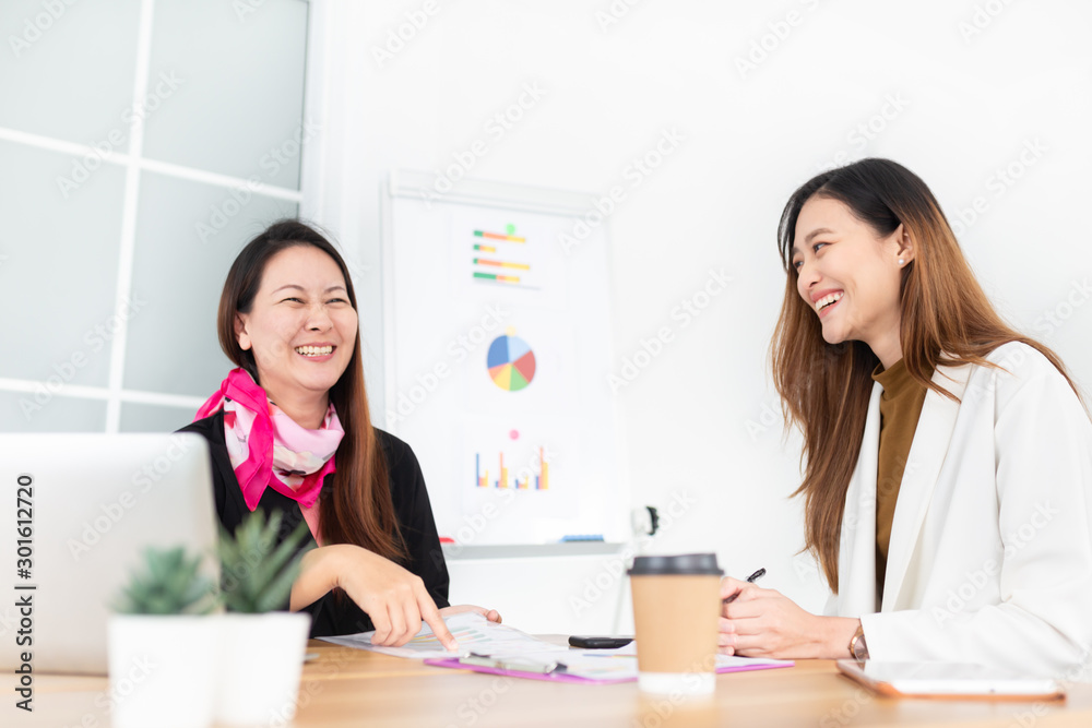 asian customer service officer talk about product information with customer, they feeling happy and laughing, happiness organization asian customer service officer talk about product information with customer, they feeling happy and laughing, happiness organization