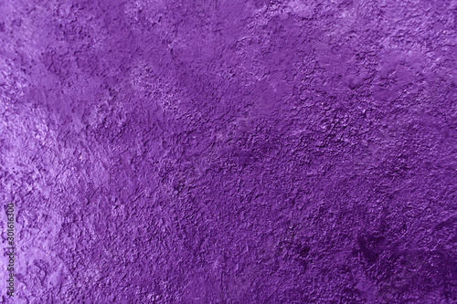The background texture of the textured wall is purple. Stylized textural banner with space for text.