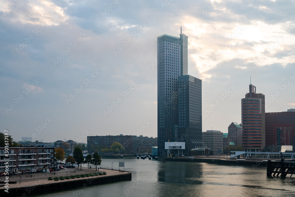 Downtown skyscrapers at the embankment of Maas river, Rotterdam. Downtown skyscrapers at the embankment of Maas river, Rotterdam.