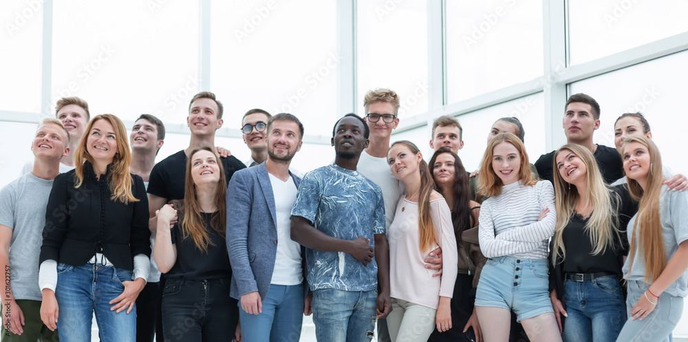 Obraz premium group of successful young people standing together.