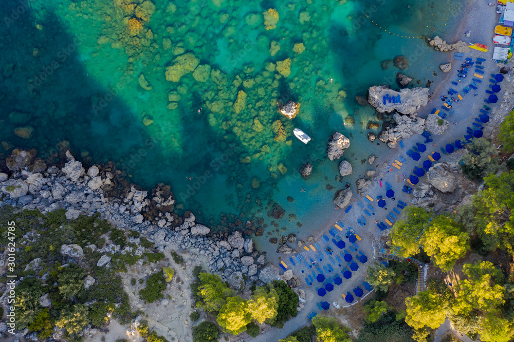 picturesque Bay of sea with beach rocks and stones, clear turquoise water, view from the drone