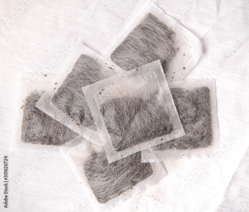 Tea bags against a white backdrop