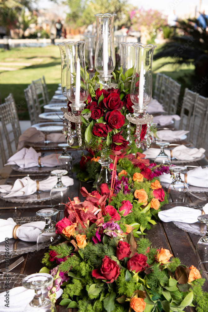 A beautifully decorated food and drinks table with candles A beautifully decorated food and drinks table with candles