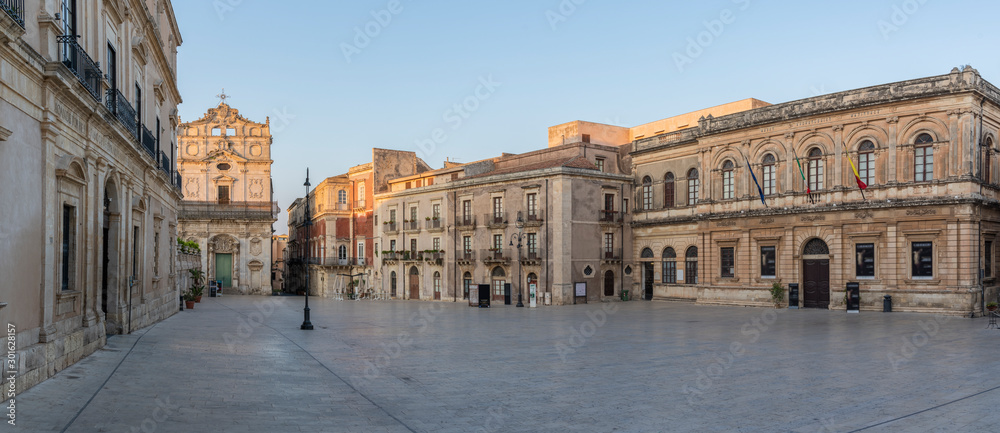 Panoramic view of the main square of the baroque city Ortigia island at sunrise in the province of Syracuse in Sicily, south Italy