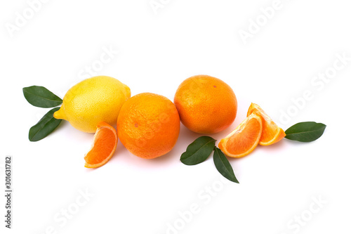 Oranges and yellow lemon on a white isolated background. Lemon and orange close-up. Juicy citrus fruits.