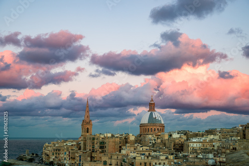 Historical Valletta Skyline with sunset clouds