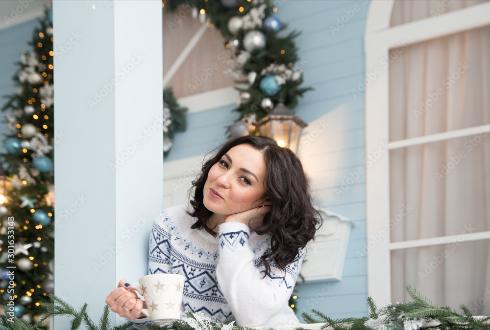 young woman over christmas interior background