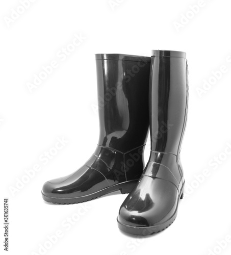 Canvastavla Black rubber boots on a white background