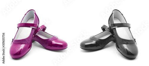Pink and black shine leather girl shoes isolated on white