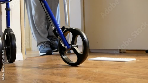 Person Uses Crutches Walking Toward Camera