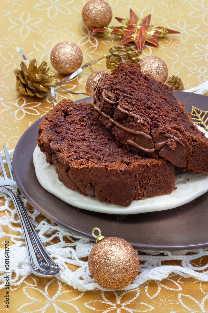 Pieces of Chocolate Banana Cake Soft toned. Selective focus. New Year and Christmas concept. Pieces of Chocolate Banana Cake Soft toned. Selective focus. New Year and Christmas concept.