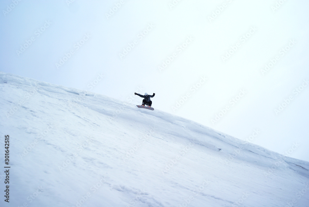Extremely snowboarder's big jump - Apatity mountain