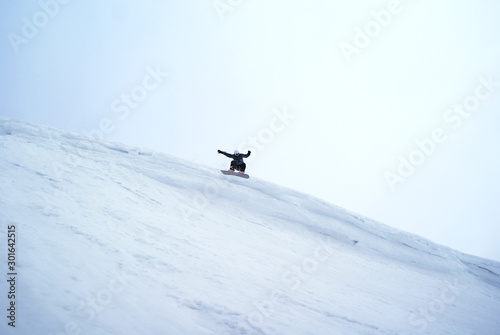 Extremely snowboarder's big jump - Apatity mountain