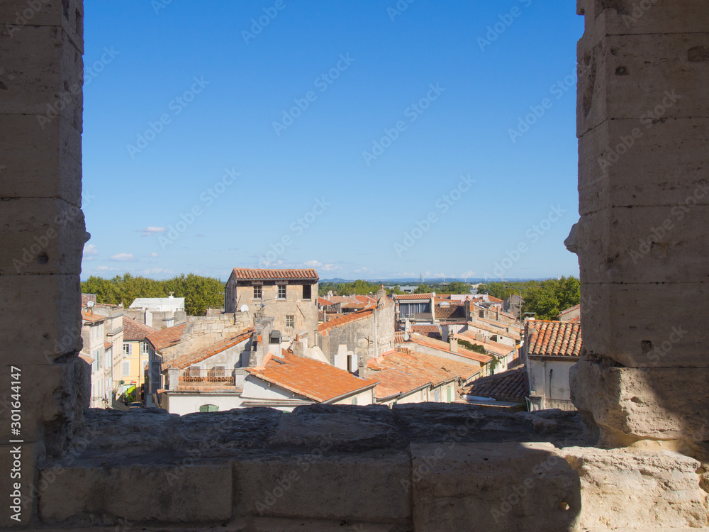 view of rural houses from stone balcony in Arles, France