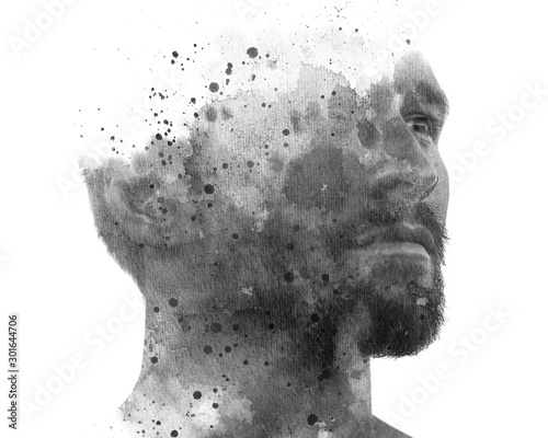 Paintography. Double exposure of an attractive male model combined with hand drawn ink painting