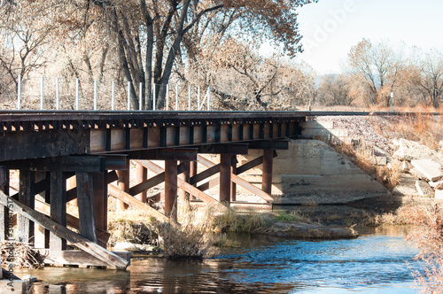 Railroad bridge over the Cache La Poudre river photo