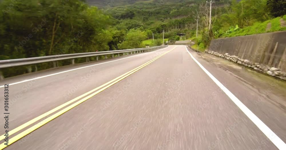 Driving car on mountain curve road Driving car on mountain curve road