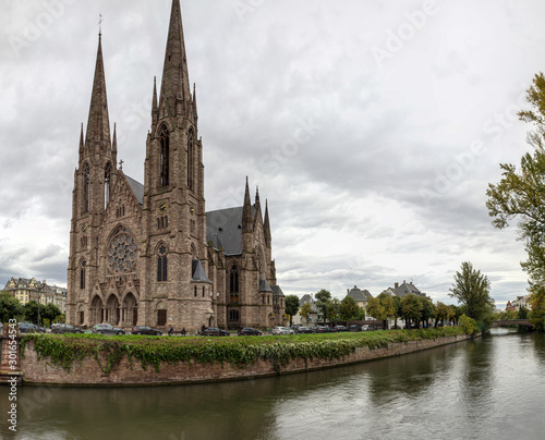 Church in Strasbourg, France on the canal