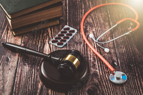 Fotografie Judge gavel deciding in a drug corruption case in a hospital.