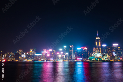 Bright Hong Kong skyline at night.