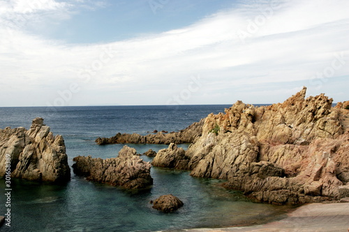 rocks and blue sea, bay in Paradiso, Sardinia Italy