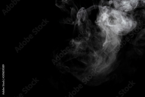 Abstract powder or smoke effect isolated on black background