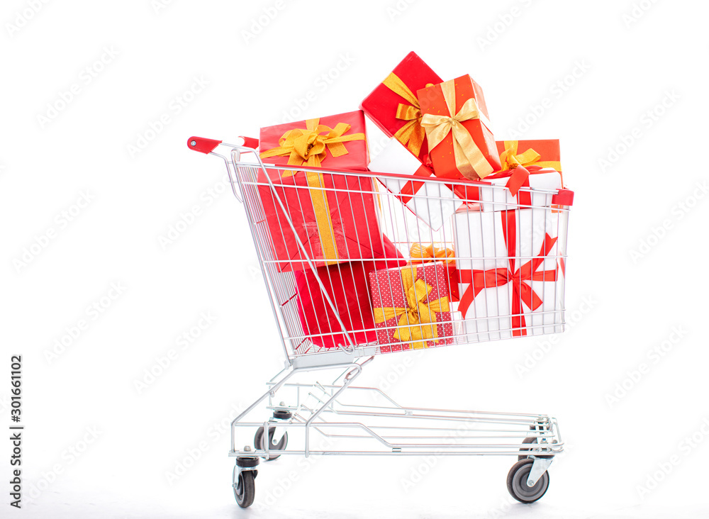 closeup shopping cart with gift box closeup shopping cart with gift box