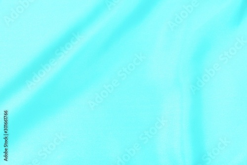 Cyan-Teal satin fabric texture soft blur background