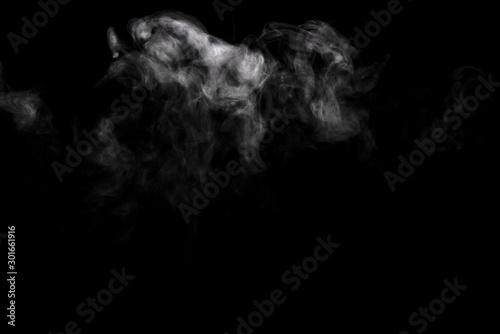 Abstract powder or smoke effect isolated on black background © sirawut