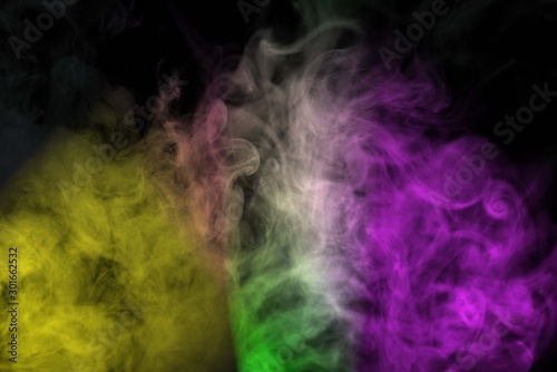 Abstract colorful smoke isolated on black background,Rainbow powder