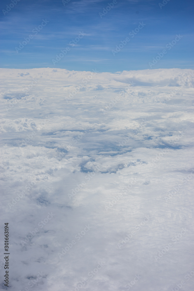 Bangalore to Pune, , a plane flying over a snow covered mountain Bangalore to Pune, , a plane flying over a snow covered mountain
