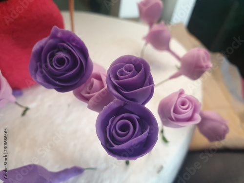 wedding rings on bouquet of roses