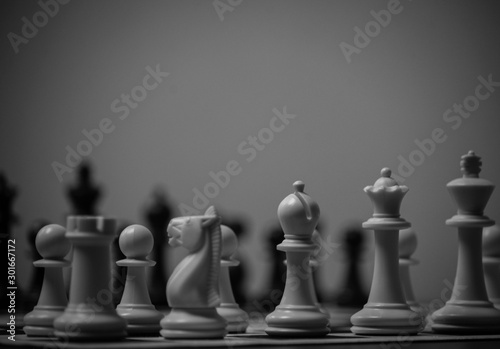 Closeup of chess pieces on board