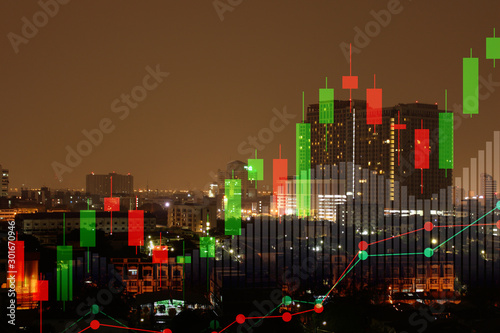 Double exposure of cityscape and stock market or financial graph for financial investment concept