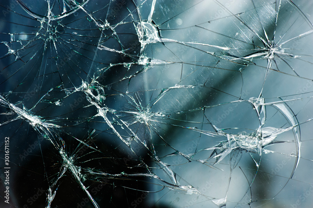 Broken glass over black background Broken glass over black background