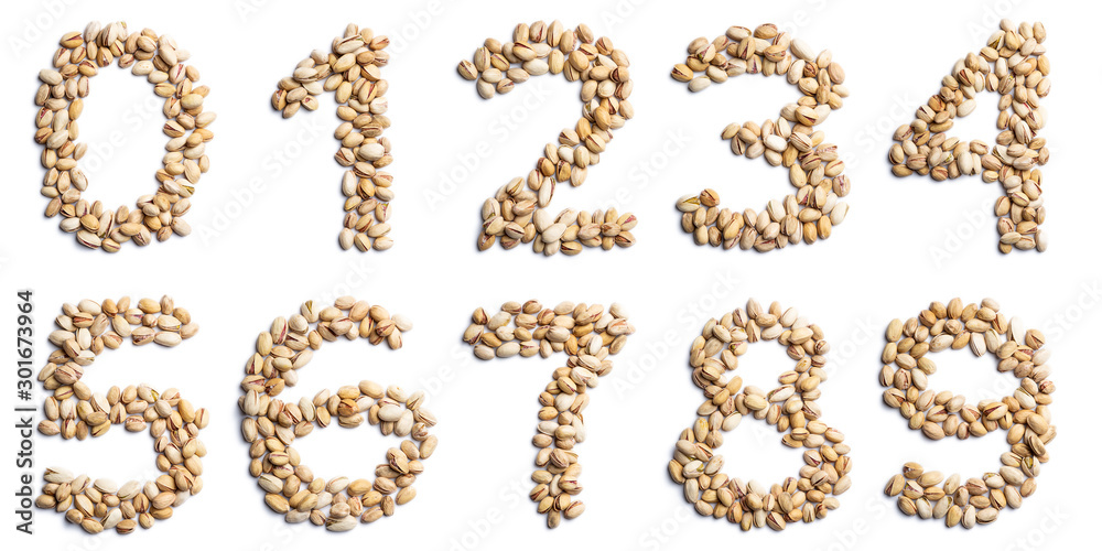 Arabic numerals from an unpeeled pistachios on a white isolated background. Unpeeled pistachios pattern. healthy food concept. Letters for composing texts Arabic numerals from an unpeeled pistachios on a white isolated background. Unpeeled pistachios pattern. healthy food concept. Letters for composing texts