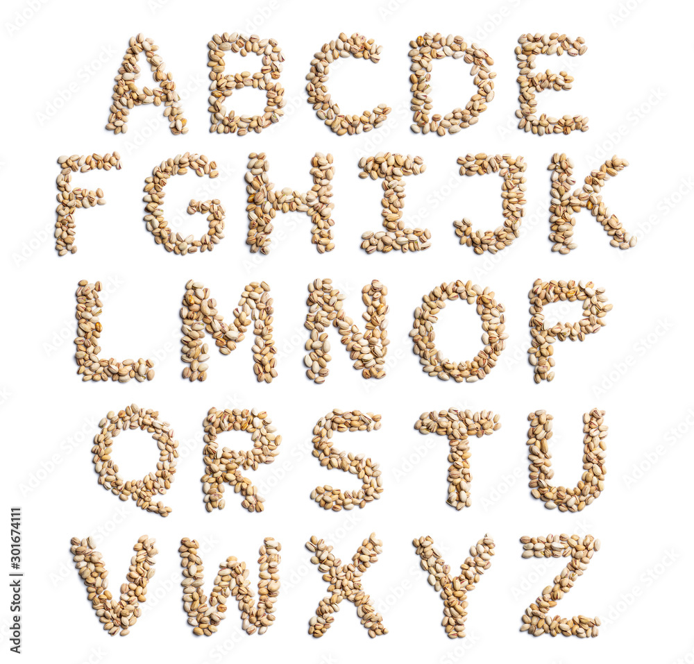 English alphabet from a unpeeled pistachios on a white isolated background. Unpeeled pistachios nuts pattern. healthy food concept. Letters for composing texts English alphabet from a unpeeled pistachios on a white isolated background. Unpeeled pistachios nuts pattern. healthy food concept. Letters for composing texts