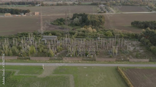 Remenants of a decommissioned power station in the countryside, drone high angle. photo