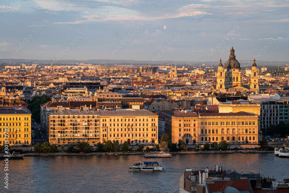 Sunset over the St. Stephen's Basilica and Budapest skyline by the Danube river in Hungary capital city