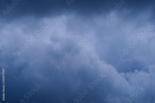 Dark dramatic sky with storm clouds background