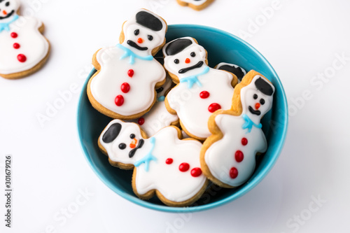 Christmas snowman cookies in a blue bowl 