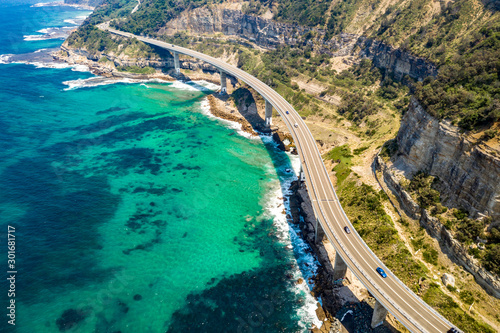 Aerial view of the iconic Sea Cliff Bridge along the beautiful coast in the northern Illawarra region of New South Wales, Australia    