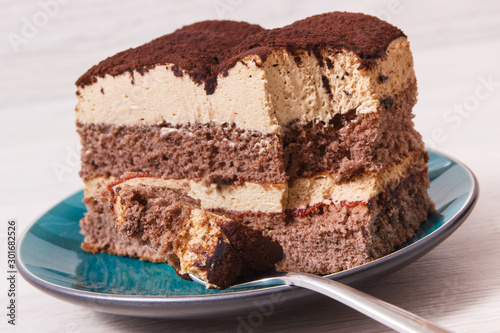 Tiramisu cake with different layers. Delicious dessert for celebrations