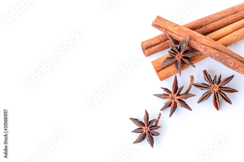 Close up Cinnamon sticks and star anise or aniseed isolated on white background. Natural herbal plant, spices seasoning conceptual.