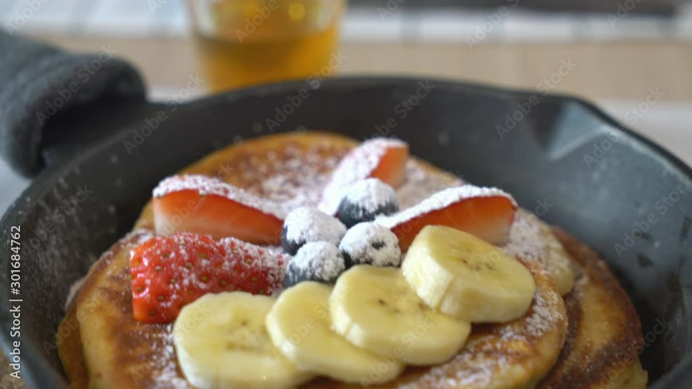 pancake with fresh strawberry bananas and blueberries
