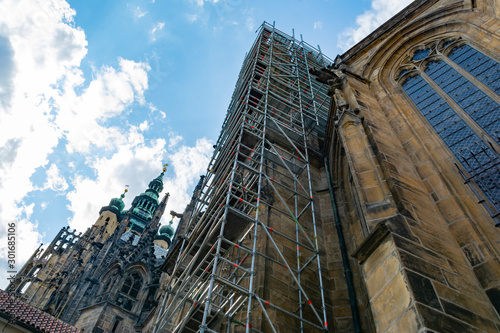 Ancient historical monument - Prague Castle, during reconstruction surrounded by scaffolding © Николай Батаев